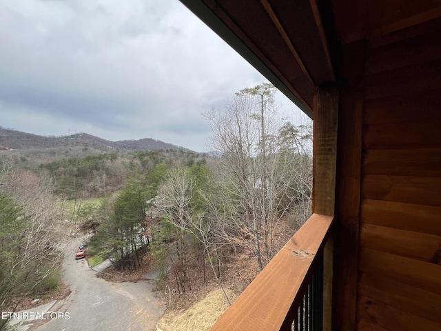 balcony featuring a mountain view