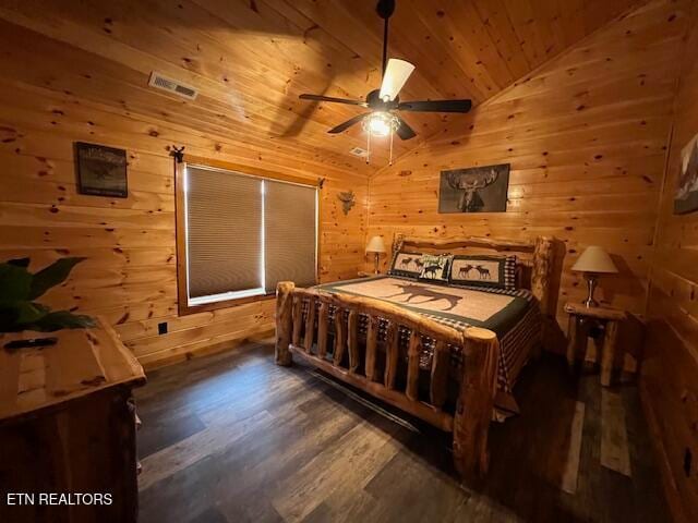 bedroom with wood walls, dark hardwood / wood-style floors, wood ceiling, and vaulted ceiling