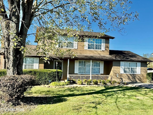 view of front of house with a front lawn