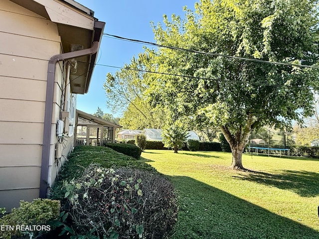 view of yard featuring a trampoline