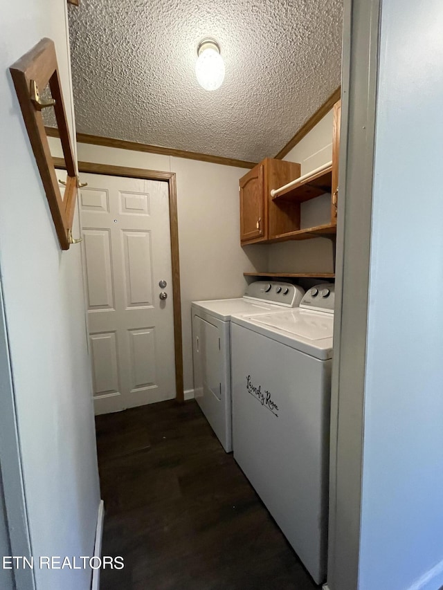 205 Magnolia Ln, Tazewell, TN 37879 - washroom with separate washer and dryer, a textured ceiling, cabinet space, and dark wood finished floors