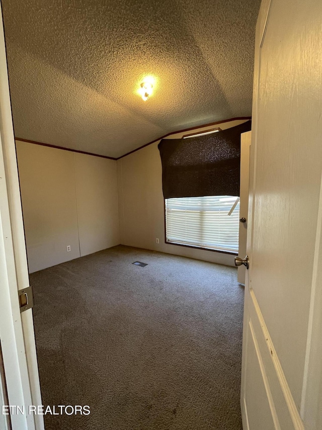 205 Magnolia Ln, Tazewell, TN 37879 - carpeted empty room featuring a textured ceiling