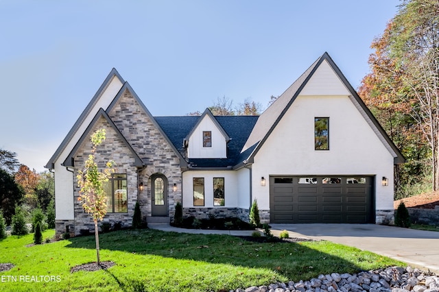 view of front facade with a front lawn and a garage