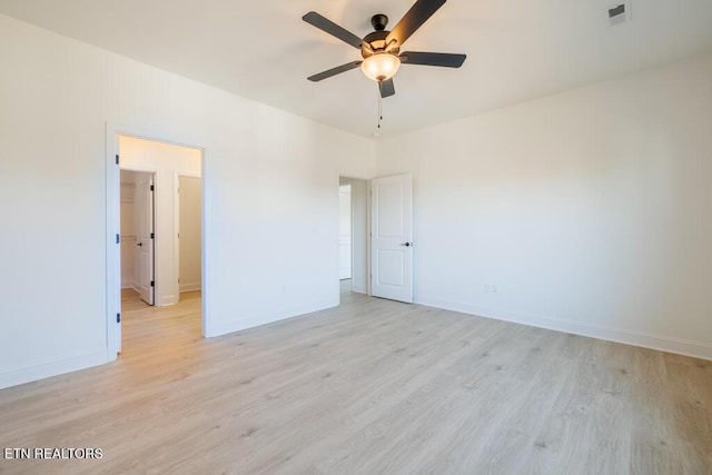 unfurnished bedroom with ceiling fan and light hardwood / wood-style flooring