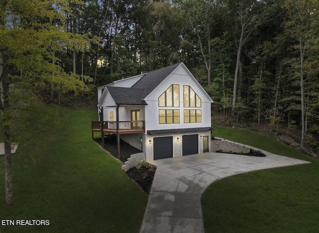 246 Clear Creek Rd, Kodak, TN 37764 - view of front facade featuring driveway, an attached garage, a front lawn, and a shingled roof