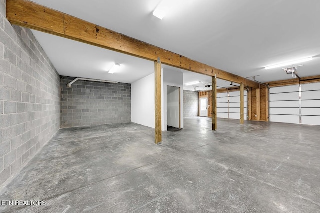 246 Clear Creek Rd, Kodak, TN 37764 - garage with concrete block wall and a garage door opener