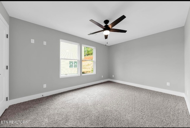 unfurnished room featuring carpet floors and ceiling fan