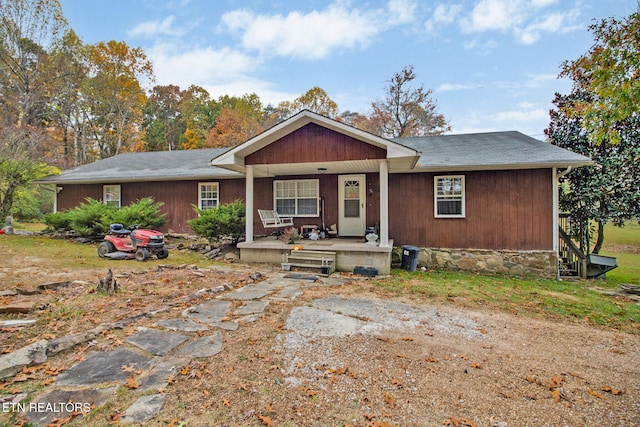 ranch-style house with covered porch