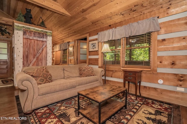 living room with wooden walls, vaulted ceiling with beams, wood ceiling, and wood-type flooring