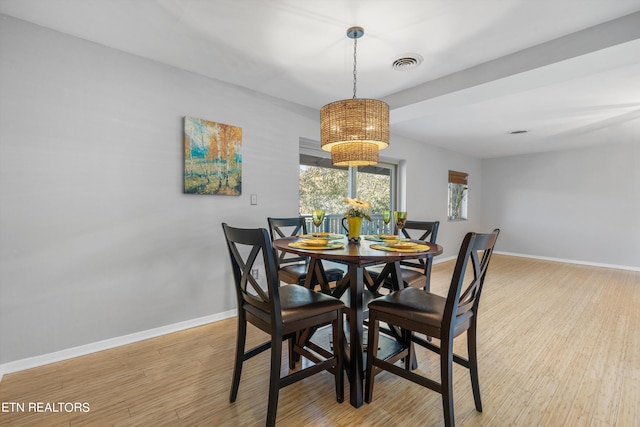 dining room with light hardwood / wood-style floors