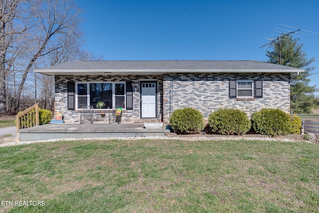 1506 W Cunningham Rd, Seymour, TN 37865 - ranch-style house featuring a front yard and brick siding