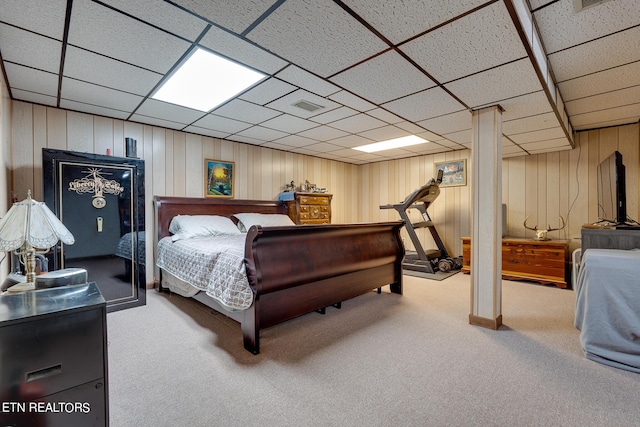 1506 W Cunningham Rd, Seymour, TN 37865 - carpeted bedroom with visible vents, wooden walls, and a paneled ceiling