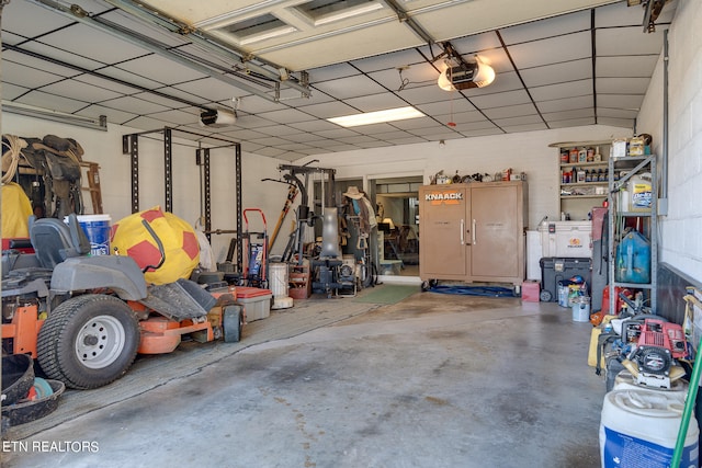 garage featuring a garage door opener