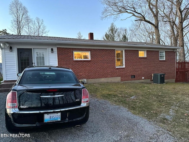 view of front of home featuring central AC unit