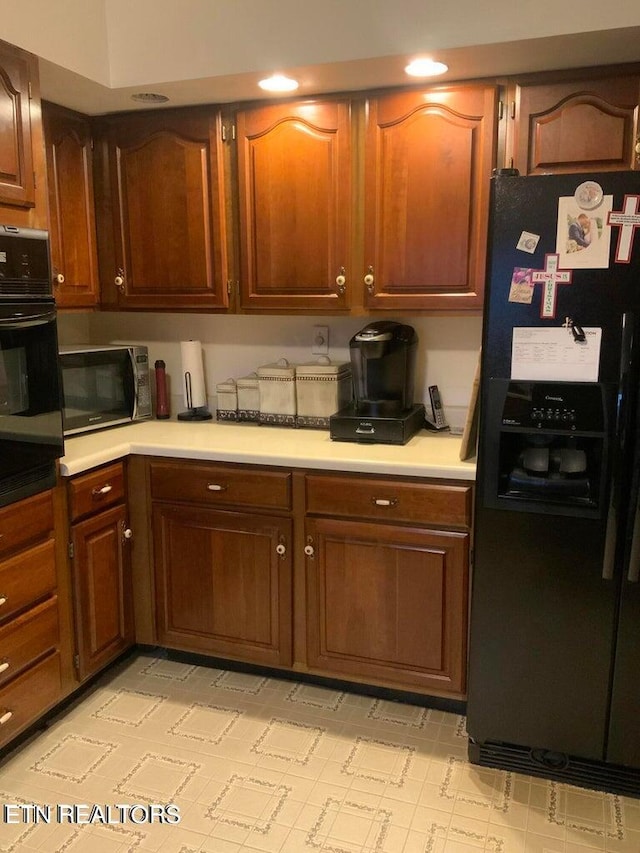 kitchen with black appliances