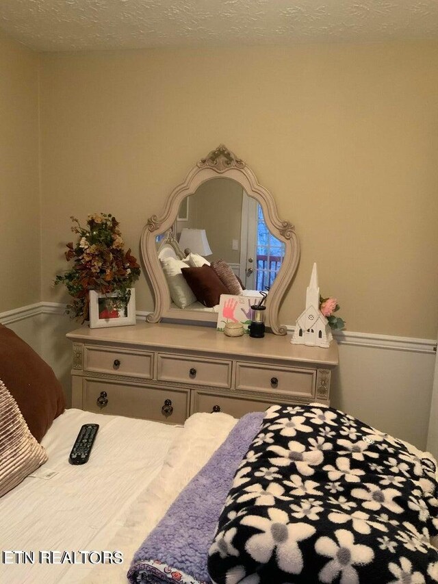 bedroom with a textured ceiling