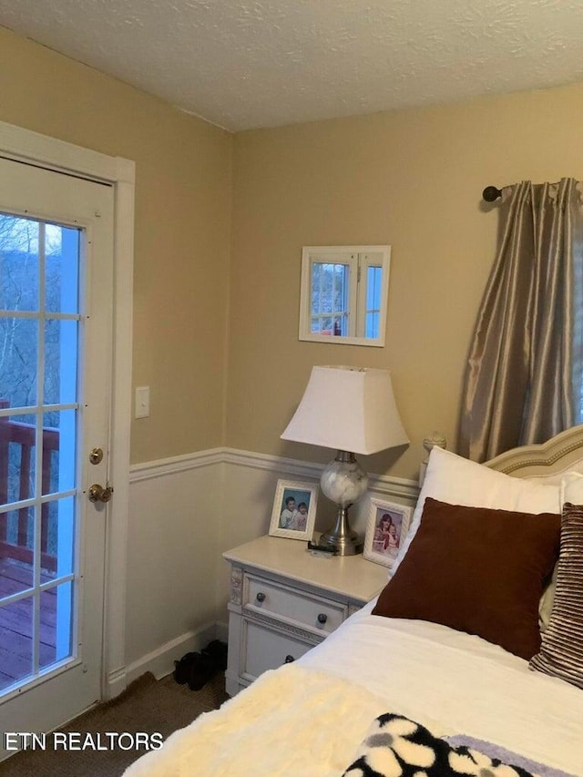 bedroom featuring a textured ceiling