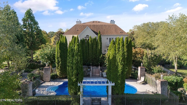 view of swimming pool with a patio