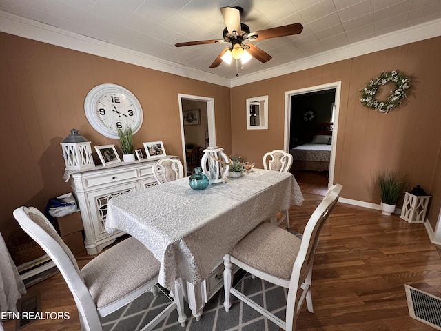 59 River Rd, Miracle, KY 40856 - dining space featuring wood finished floors, ornamental molding, and a ceiling fan