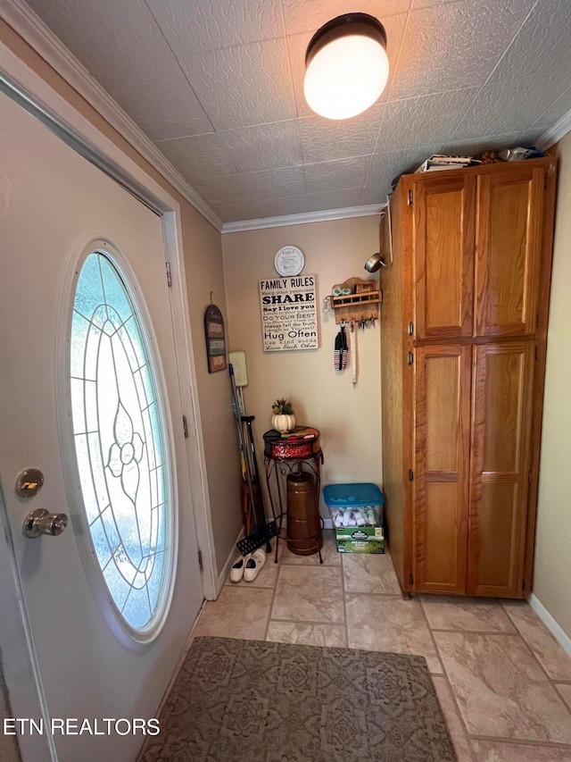 foyer entrance with ornamental molding