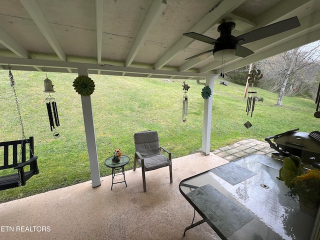 view of patio featuring ceiling fan