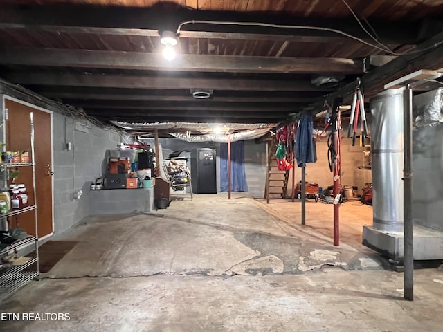 basement featuring heating unit