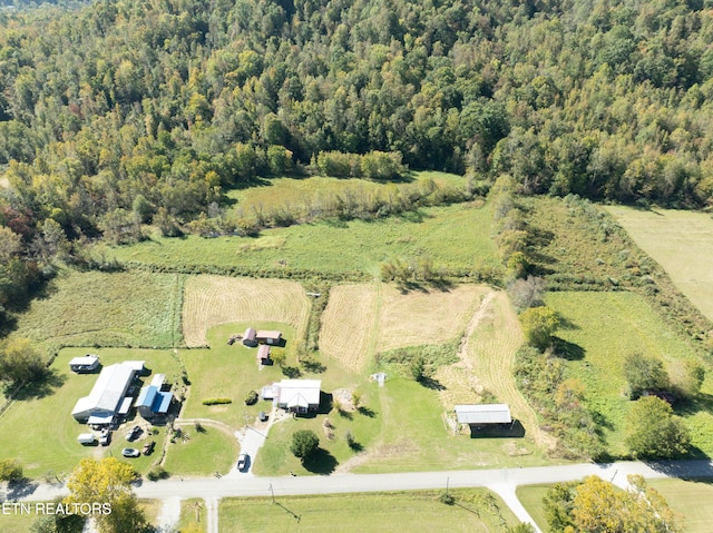 birds eye view of property featuring a rural view