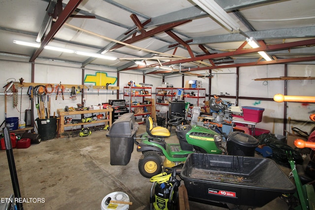 garage with a workshop area