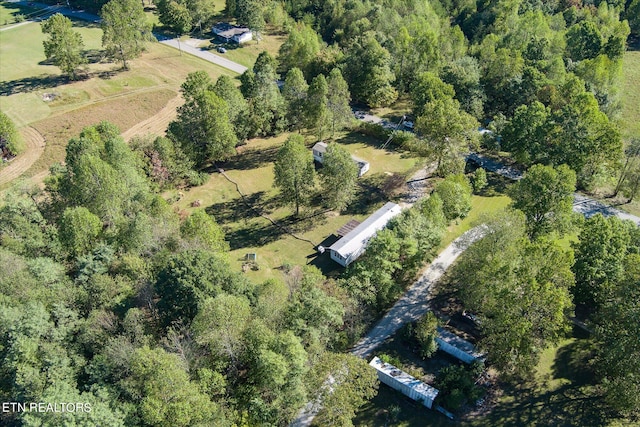 birds eye view of property with a rural view