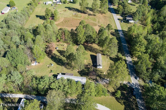 birds eye view of property featuring a rural view