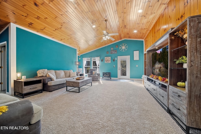 carpeted living room featuring lofted ceiling, wooden ceiling, and ceiling fan