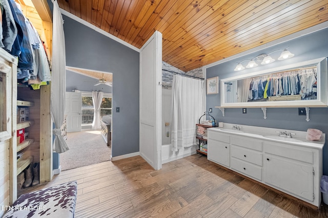 bathroom with wood-type flooring, ceiling fan, wooden ceiling, lofted ceiling, and vanity