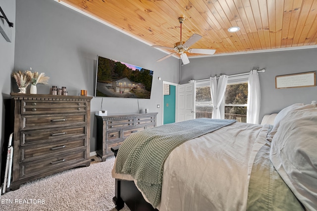 carpeted bedroom with wood ceiling, ornamental molding, lofted ceiling, and ceiling fan