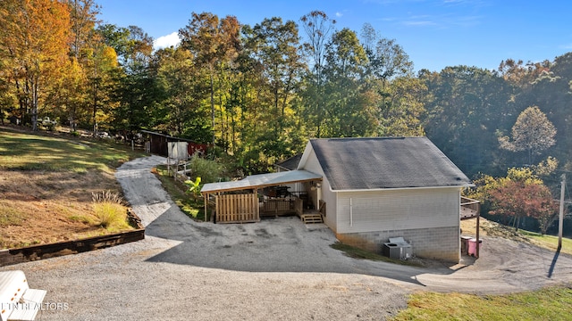 exterior space with a carport