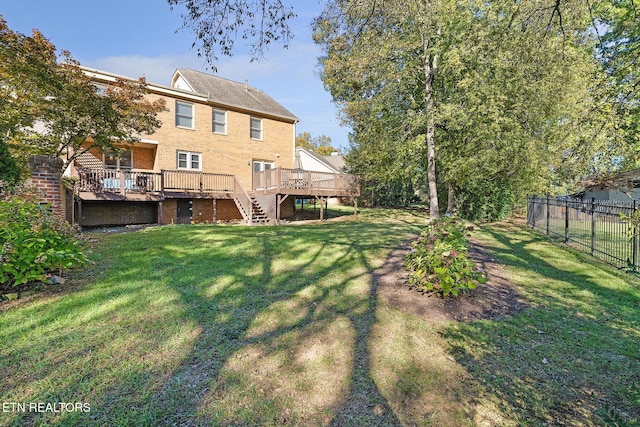 view of yard featuring a deck