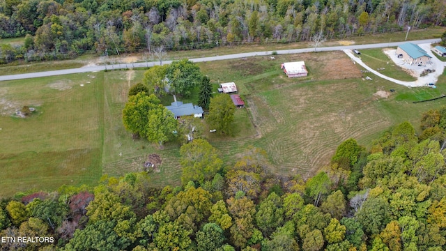 birds eye view of property featuring a rural view