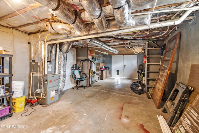 basement featuring heating unit