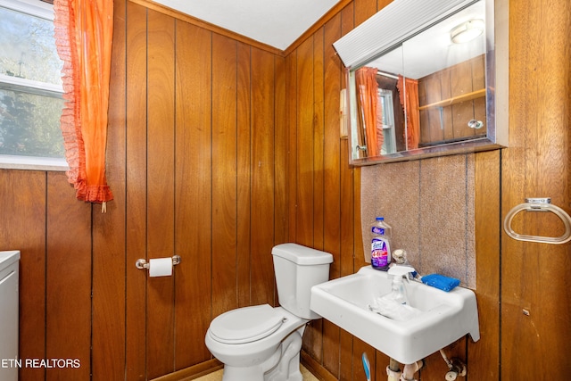 7338 Palmleaf Rd, Knoxville, TN 37918 - half bath with toilet, a sink, and wood walls