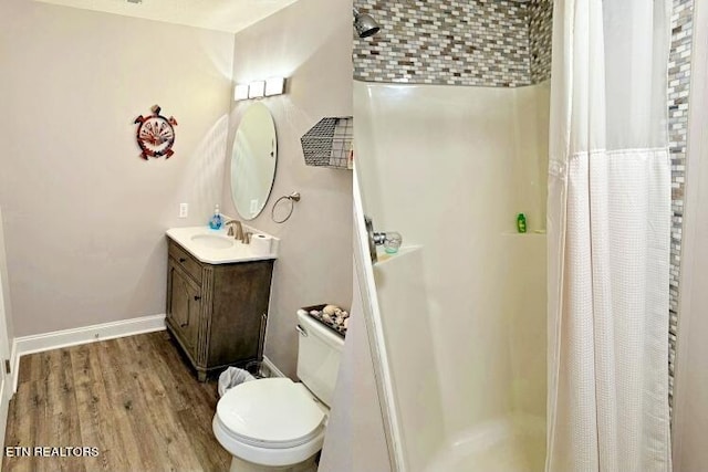 240 Mariner Point Rd, Lafollette, TN 37766 - bathroom featuring vanity, wood finished floors, toilet, baseboards, and a shower stall