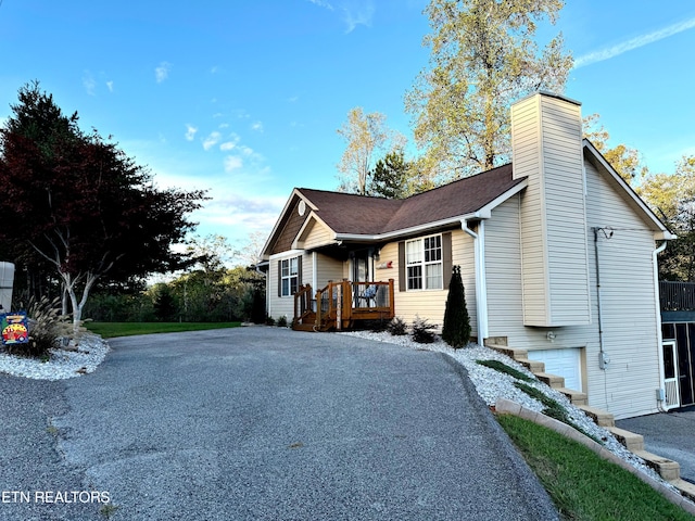 240 Mariner Point Rd, Lafollette, TN 37766 - view of side of home with a chimney and driveway