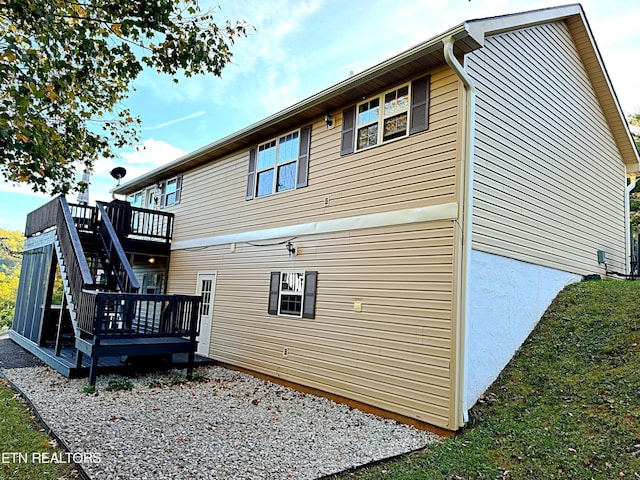 240 Mariner Point Rd, Lafollette, TN 37766 - rear view of property featuring a wooden deck and stairs