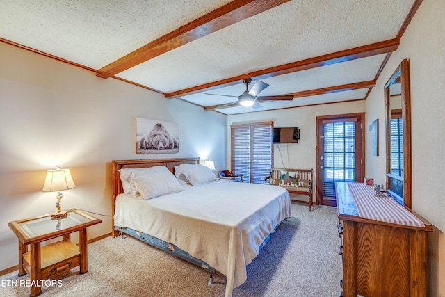 bedroom with beamed ceiling, ceiling fan, a textured ceiling, and carpet flooring