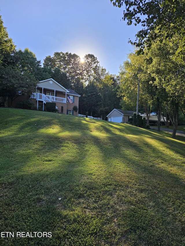 view of yard featuring a garage