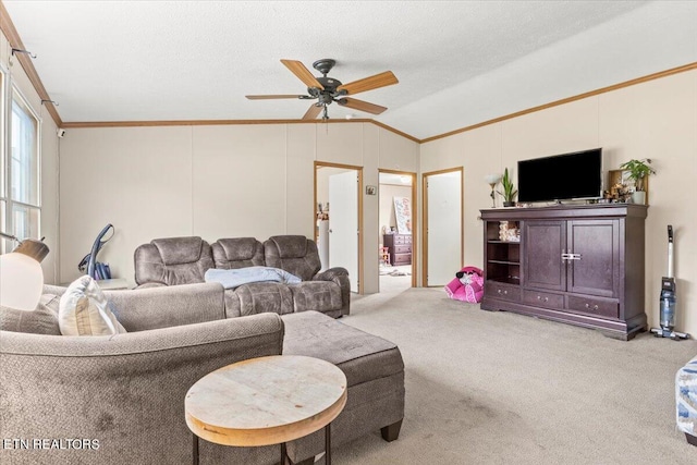 carpeted living room featuring crown molding, vaulted ceiling, a textured ceiling, and ceiling fan