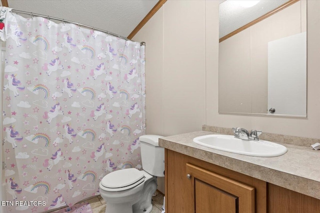 bathroom featuring crown molding, toilet, vanity, and a textured ceiling