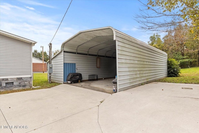 view of outdoor structure with a carport