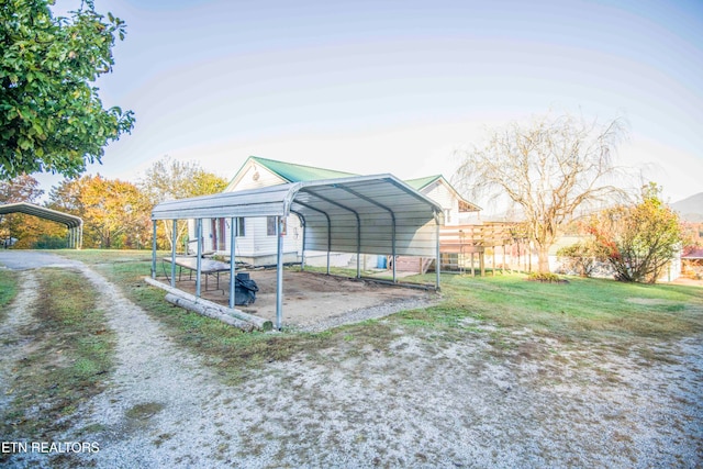 view of outbuilding with a carport