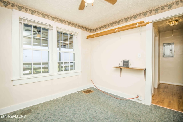 empty room with visible vents, baseboards, ceiling fan, a textured ceiling, and carpet