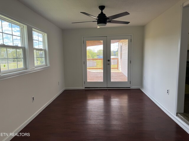 11806 Dry Valley Rd, Loudon, TN 37774 - unfurnished room with dark wood-style flooring, french doors, baseboards, and ceiling fan