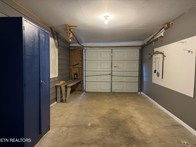 11806 Dry Valley Rd, Loudon, TN 37774 - garage with baseboards